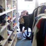 A client searches for clothing at the Kiwanis Clothing Bank location in 2016. Leah Abraham/File photo