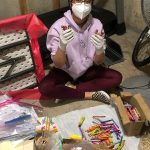 Diya Garg sanitizes crayons she receives from restaurants, before distributing them to local low-income students. Courtesy photo/Diya Garg.