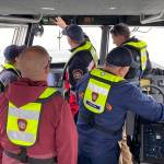 South King Fire and Rescue members provide a tour of the new vessel to firefighters from Chesapeake, Virginia. Olivia Sullivan/the Mirror