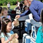 Children grab their free bag lunch through the Renton Summer Meals program. Photos courtesy of Renton School District.
