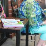 Sylvia reads several books during the hour-long Drag Queen Storytime. Photo by Bailey Jo Josie/Sound Publishing.