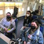 Renton native Marina Beltran, left, sits on the NASA SOFIA with her Embry-Riddle Aeronautical University classmates Alexis Lane, center, and Teagan Laws, right. Photo courtesy of Embry-Riddle and Dr. Noel Richardson