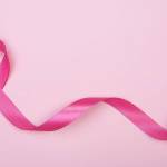 The pink ribbon is a symbol of Breast Cancer Awareness Month, which people wear to honor survivors; remember those who passed away from the disease; and to support the progress of defeating breast cancer. Courtesy of Benefits.Gov.