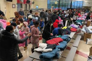 Over 850 coats were prepared for this years Operation Warm at Renton High School on Oct. 22. Photo courtesy of Ruth Pérez