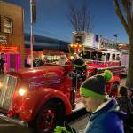 After the tree lighting, Santa Claus rolled up with his friends at Renton Regional Fire Authority, Saturday, Nov. 30, 2019, at Piazza Park. File photo