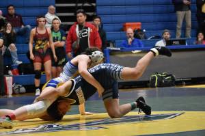 Photo by Ben Ray
Lindbergh Jr. Jasmin Cruz-Abarca is in a precarious situation on the way to her win on Tuesday, Dec. 6.