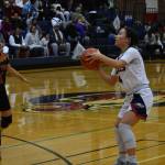 Lindbergh point guard Caitly Ho takes a three in their win over the Tyee Titans.