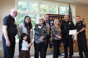 Renton Rotary Clubs RotaCare fund gift roughly $43,000 to help support FD CARES. Renton Rotary Club leaders, Renton Mayor Armondo Pavone, Renton City Council members, and representatives from the police and fire celebrate the donation. Cameron Sheppard/Renton Reporter