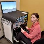 Photos by Robert Whale, Auburn Reporter
Colie Brooks at work learning how to integrate wing flaps into her landing procedure on a simulator at the GRC Aviation Center.