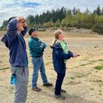 Photo by Tamera Kapule, Green River College
GRC Aviation Instructor Frank Cantwell schools students in the fine points of flying a drone.