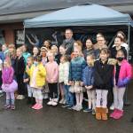 Photo by Bailey Jo Josie/Sound Publishing.
Dancers of all ages joined Renton Mayor Armondo Pavone for a photograph in front of the new studio.