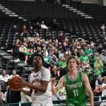 Redhawk Dennis Johnson drives to the basket inside the Yakima Valley SunDome. Ben Ray / The Reporter