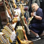 Guests at the guitar show were encouraged to pick up and play with the instruments. Photo by Bailey Jo Josie/Sound Publishing