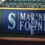 Hazens Jason Grossnickle (12) makes a throw to second base during warm-ups.