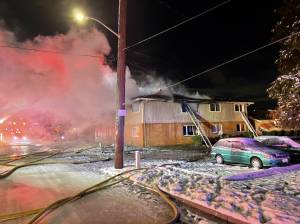 Courtesy of the Renton Regional Fire Authority
Renton firefighters responded to an intentionally set fire blocking the stairwell of a two-story apartment building on Dec. 7, 2021. Residents jumped from the windows of the building, suffering broken bones and burns.