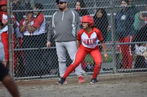 Amayah Chao takes a lead off third base in the game against Evergreen. Ben Ray / The Reporter