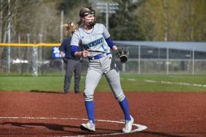 Elyse McMullin toes the slab in the circle for the Patriots in the win over Juanita. Ben Ray / The Reporter