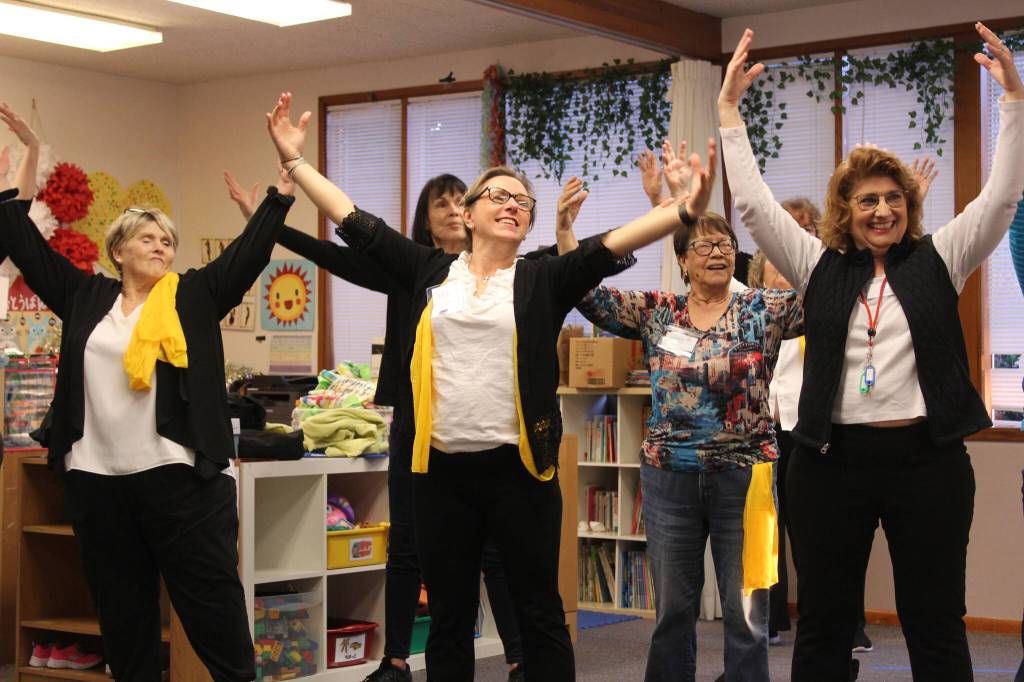 Theatricality is the name of the game during Song of Seattles rehearsals.