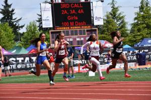 Kayla Kittrell on her way to a podium position in the 100-meter sprint. Ben Ray / The Reporter