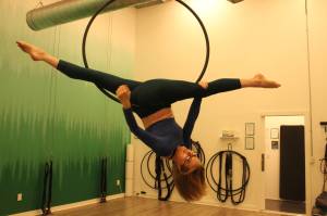 Maggie Nation shows her favorite aerial pose on the lyra - the Jade Split. Photo by Bailey Jo Josie/Sound Publishing.