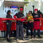 The Soul Fusion food truck is now officially open for business. The down home soul food experience is now available wherever in Renton the truck may be parked. For the trucks ribbon cutting ceremony on Friday, June 23, the top-selling item on the menu was the Catfish Sandwich Combo, which Renton Reporters advertising representative Sianna Foster reports was sould out before she even arrived to the ceremony. Foster had the Fusion Burger, which she says was so good I couldnt stop eating it even though my body begged me to stop. Visit soulfusionfood.com to learn where the truck will be next. (Photo by Sianna Foster/Renton Reporter)