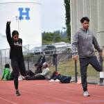 Both Rosario siblings warm up. Ben Ray / The Reporter