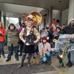 Photo by Bailey Jo Josie/Sound Publishing.
Sylvia OStayformore (center, in the Christmas sweater and wig) poses with counter-protesters hours before she reads childrens books for her monthly Drag Queen Story Time.