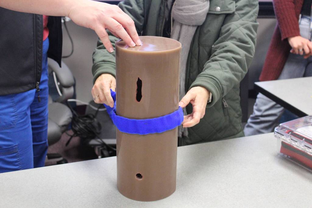 Leg models with various types of wounds were used to practice using tourniquets. Training dictates that tourniquets should be placed 2-3 inches above the wound. Photo by Bailey Jo Josie/Sound Publishing.