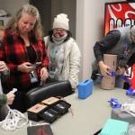 Photo by Bailey Jo Josie/Sound Publishing.
Staff at Bryn Mawr Elementary School practice putting pressure on different wound models.