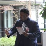 Josias Jean-Pierre reads a passage from his book Our Cry For Justice.