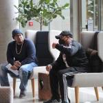 Emcee Charles Conner talks with Dominique Davis of the nonprofit Community Passageways. Photo by Bailey Jo Josie/Sound Publishing.