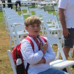 Photo by Bailey Jo Josie/Sound Publishing
A young boy sings along with the Ukrainian National Anthem.