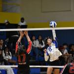 Noelani Kaiwi goes for a kill in against Renton. Ben Ray/ The Reporter