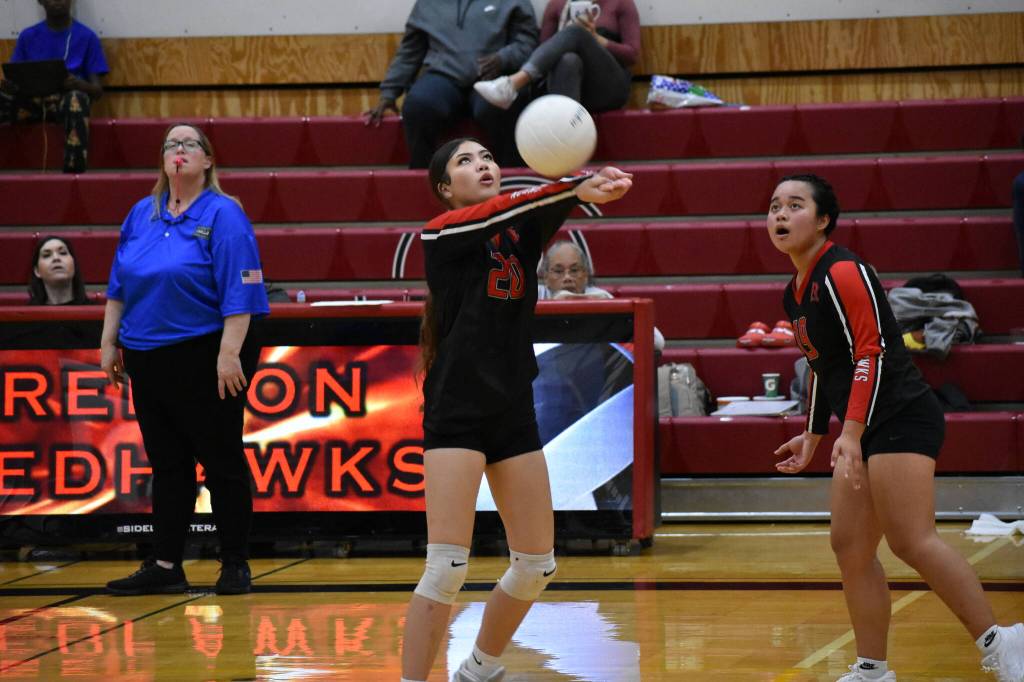 Freshman Christianna Nickles bumps the ball against the Titans in the first set. Ben Ray / The Reporter