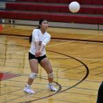 Sherley Martinez with a pass to a teammate in the second set against Tyee. Ben Ray / The Reporter