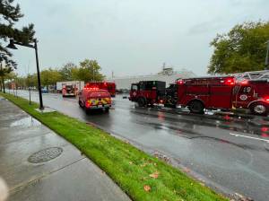 Crews removed the rooftop of a vehicle involved in a collision with a semi-truck Oct. 16 to extricate the patient trapped inside. (Courtesy of the Renton Regional Fire Authority.)