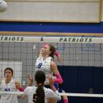 Junior Maiya Lester goes up for a kill. Ben Ray / The Reporter