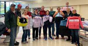 Courtesy photo
At this years annual Renton Rotary Operation Warm program, more than 800 free new coats were provided to children throughout the community. Every child, regardless of their economic situation, deserves a brand new coat. Our club believes a brand new coat is more than a coat, and offers a child physical and emotional warmth, confidence to socialize and succeed, and hope of a brighter future, said Al Ralston, Renton Rotary President. Operation Warm provides not just physical warmth, but so much more. Without a warm coat, many children in need miss school, which also means they miss the education they need as well as a free or reduced breakfast and lunch that fuels their bodies. In addition, having a beautiful brand new coat builds self-esteem and peer acceptance, giving children the confidence they need to succeed.