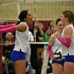 Kendreah Beazer and Layne Ford celebrate a point in the second round of the District 2 3A tournament. Ben Ray / The Reporter