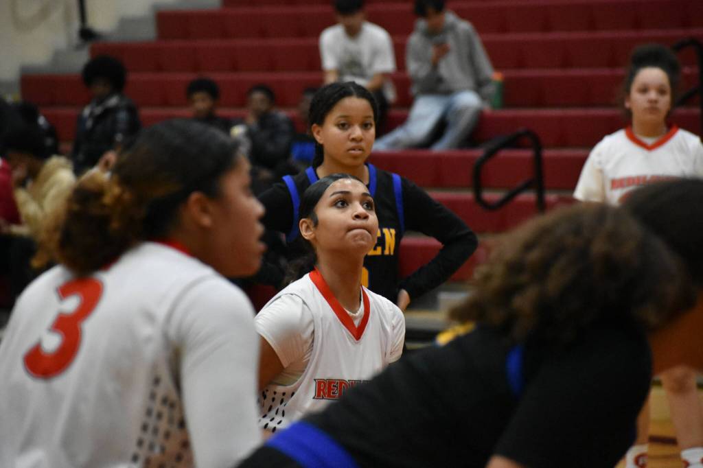 Lyric Williams has her eyes on the basket at the free-throw line. Ben Ray / The Reporter