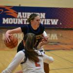 Dakota Nap tries to avoid a defender with a dribble move. Ben Ray / The Reporter