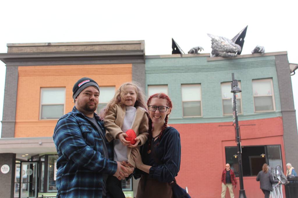 Photos by Bailey Jo Josie / Renton Reporter
Samuel, Adeline and Ash Blythe pose with the red dragon egg they found during the April Dragon Scavenger Hunt. There were a total of red dragon eggs hidden throughout the city for the dragon egg hunt.