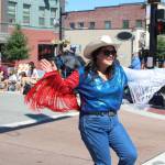 Line Dancers dazzle at the Renton River Days Parade.