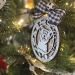 Custom ornaments on display in the window of Foxwood Engraving. Photo by Bailey Jo Josie/Sound Publishing