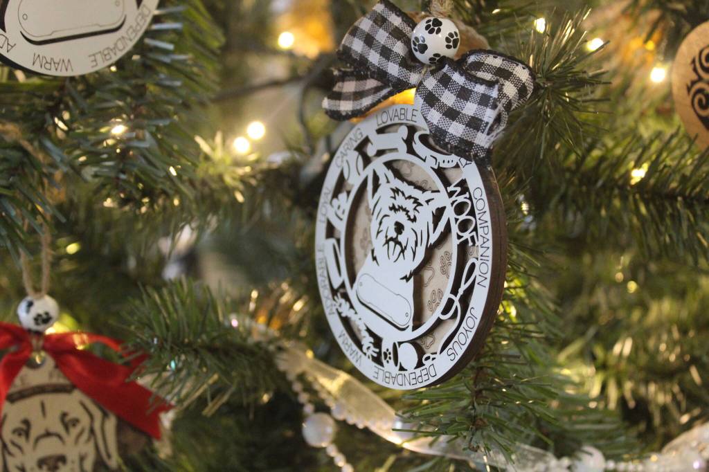 Custom ornaments on display in the window of Foxwood Engraving. Photo by Bailey Jo Josie/Sound Publishing