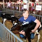 New King County Agricultural Commissioner Leann Krainick with one of her calves at the last King County Fair. (Photo by Heather Curbow)