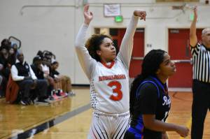 Leilah Spalding holds the finish on one of her seven three-pointers. Ben Ray / The Reporter