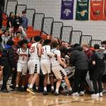 The mad rush at the end of the game after Jacob Layton won the game for the Redhawks. Ben Ray / The Reporter