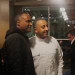 Efrem Fesaha (right) poses for pictures at Boon Boonas five-year celebration party. (Photo by Bailey Jo Josie/Sound Publishing)