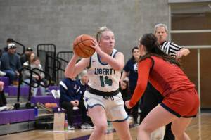 Kendall Leavitt hit a huge three-pointer to send the game to overtime in this same spot on the court, four minutes later at Lake Washington HS. Ben Ray / The Reporter